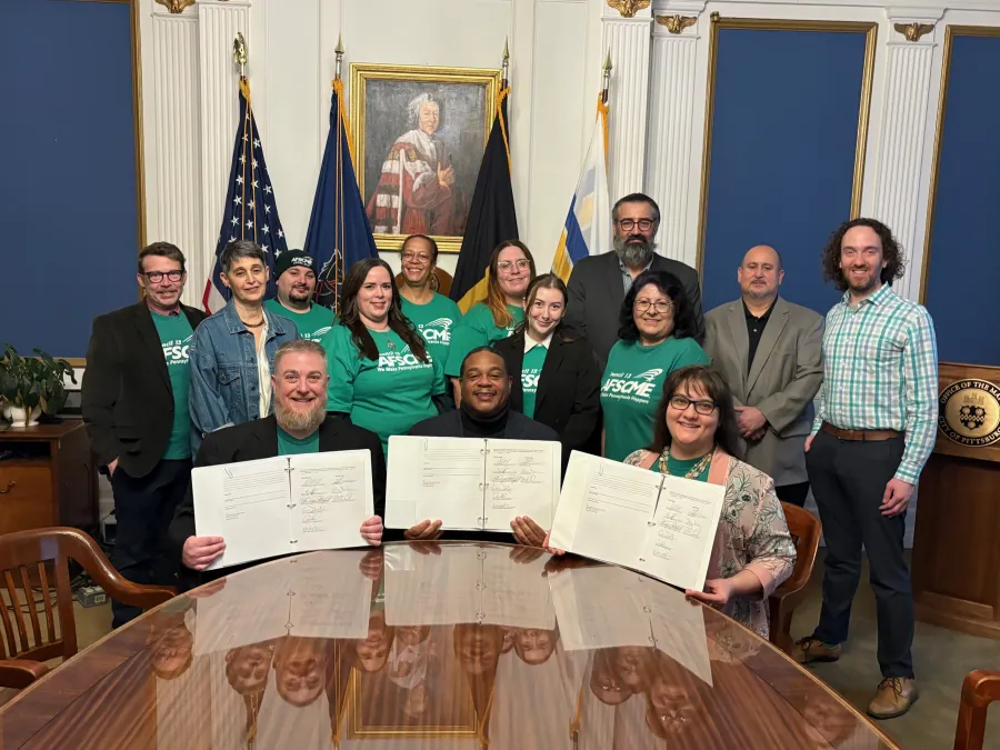 group of afscme members contract signing