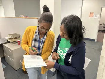 afscme member signing union card